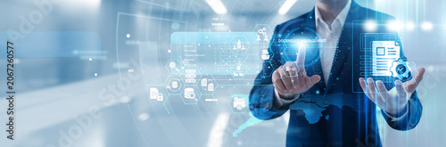 Administrator hand touching document management system on tablet to organize digital files, streamline archival workflows and ensure secure data retrieval for modern office environments.