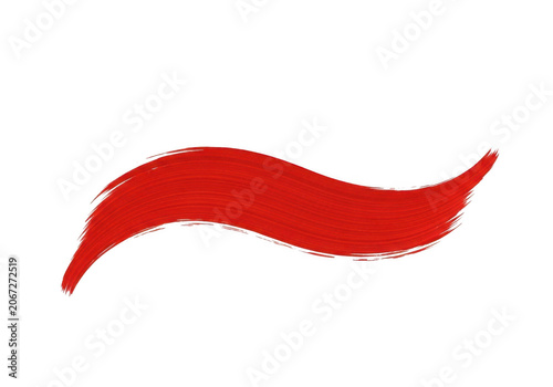 Red wavy paint brush stroke isolated on a white background