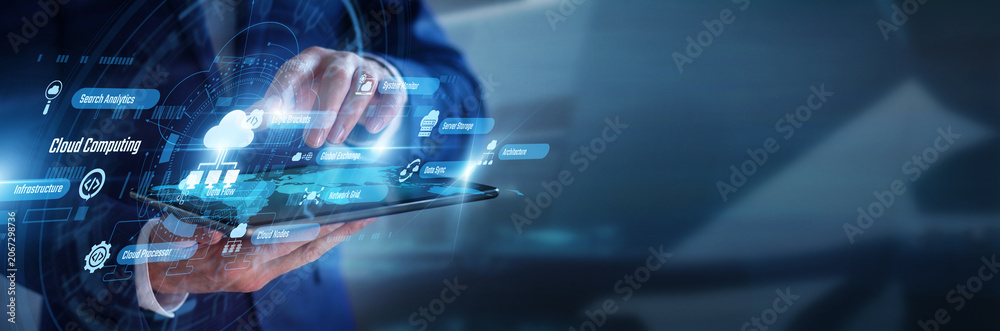 Obraz premium Network architect working on tablet managing global Cloud Computing. Professional analyzing secure data storage centers and digital server infrastructure on a futuristic glowing hologram screen.