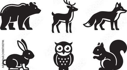 Set of black silhouette icons featuring various wild forest animals including a bear deer fox rabbit owl and squirrel Vector