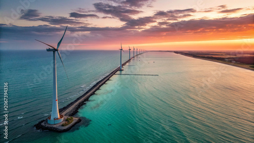 Offshore wind turbines at sunset