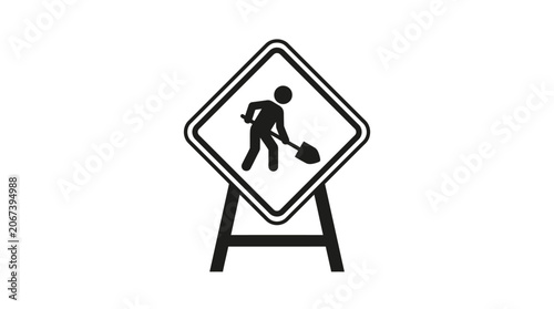 Fotografía Road work ahead sign with silhouette of worker using shovel black on white