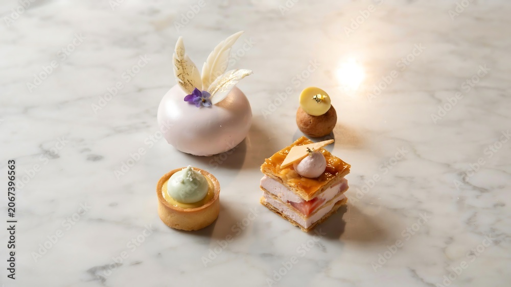 Fototapeta premium Top-view gourmet dessert with elegant decorative presentation.