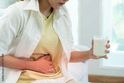 Photos felling stomachache and diarrhea, soy allergens, Sick sad unhealthy ill allergic woman, r allergy trigger symptoms