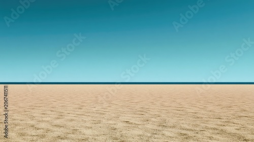 Vast golden sand meets tranquil blue ocean and clear sky