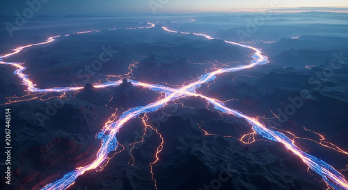 Aerial view of a landscape with glowing electric blue and orange lines crisscrossing the terrain against a dark background with a hint of light on the horizon.