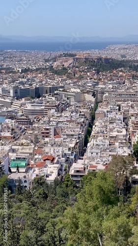 Athens vertical video over city to Parthenon temples Acropolis Greece
