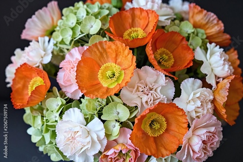 A bouquet of colorful flowers on a black background