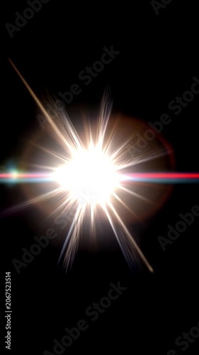 Glowing lens flare moving across an empty black background, vertical video featuring cinematic light streaks, radiant glow and elegant visual effects