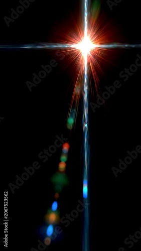Glowing lens flare moving across an empty black background, vertical video featuring cinematic light streaks, radiant glow and elegant visual effects