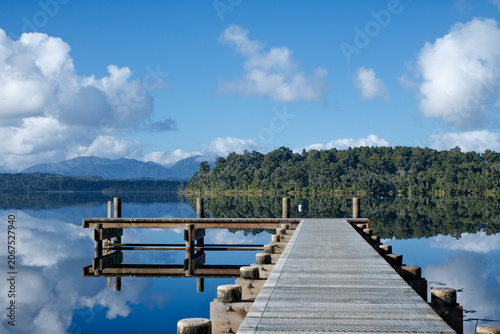 Mirror reflection of Lake Mahinapua in New Zealand