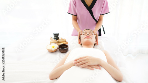 Woman spa body and face treatment and massage aroma therapy product relax and healthy and beauty. Spa Thai therapy treatment aromatherapy for body and face. Young woman enjoying and relax massage 