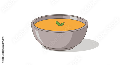 A bowl of yellow soup.