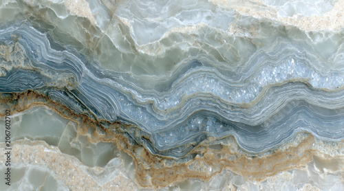 Fotografía Intricate blue-grey marble layers with wavy vein patterns veined texture