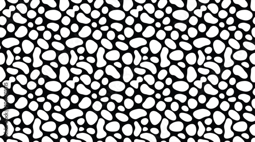 Fotografie Seamless pattern of organic rounded white blob shapes on a solid black backgroun