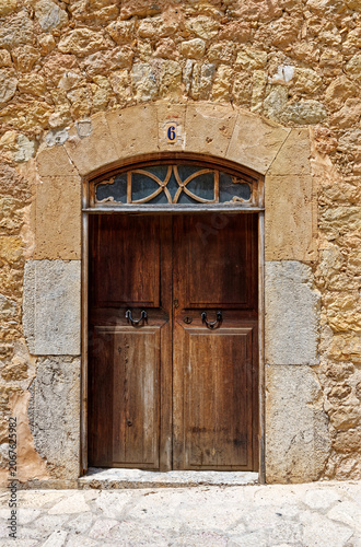 Old street in historic town of Deia in the mountains of Mallorca, Spain