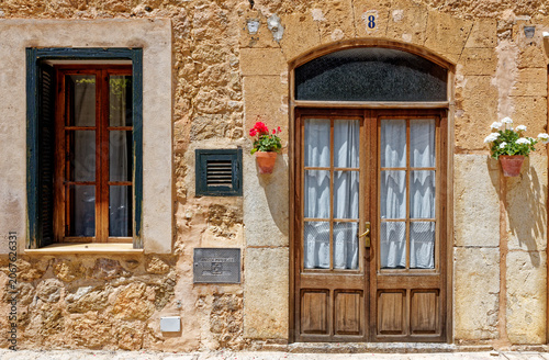 Old street in historic town of Deia in the mountains of Mallorca, Spain