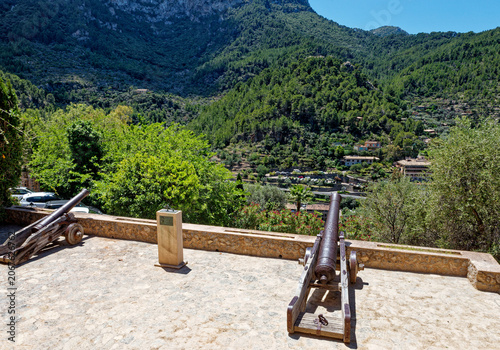 Cannon on church grounds in Deia village, Mallorca island, Spain