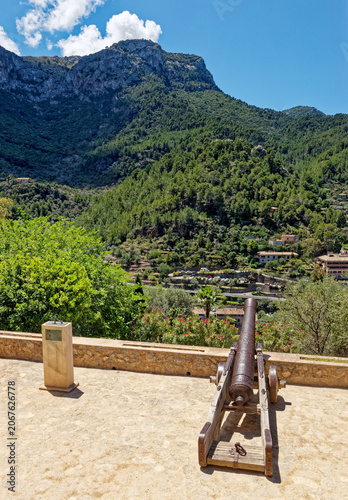 Cannon on church grounds in Deia village, Mallorca island, Spain