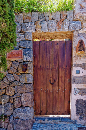 Old street in historic town of Deia in the mountains of Mallorca, Spain