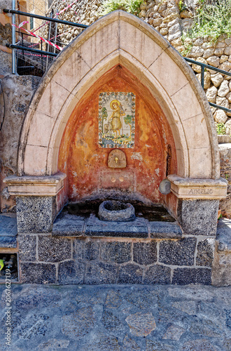 Stone fountain in the Artist village Deià, Mallorca, Balearic Islands, Spain