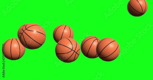 Multiple 3D animated basketballs falling from above and bouncing on the floor against a green screen background for sports themed visual editing projects.