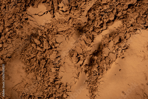 Artisan cocoa powder background for healthy dessert concept