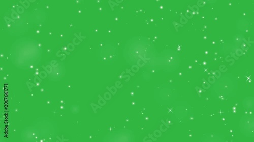 Twinkling White Stars And Magical Sparkling Fairy Dust Particles Floating On Green Screen Background