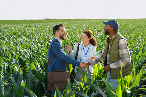 Принти на полотні Bank representatives meeting with a farmer after approving financing for agricultural operations and expansion