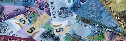 Foto Solomon Islands dollar money bills in pile