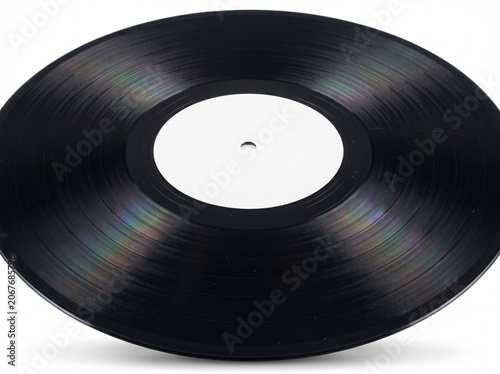Close-up of plain black vinyl record on seamless white background, soft studio lighting highlighting spiral grooves and iridescent shimmer texture.