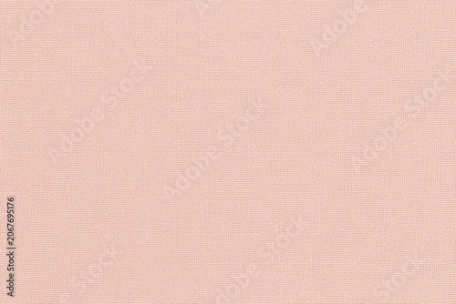 a close up of a peach colored fabric background