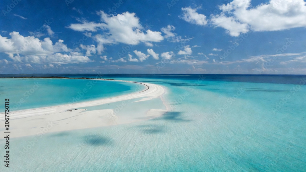 Obraz premium Aerial Drone View of Tropical White Sand Beach and Crystal Clear Turquoise Ocean, Stunning Summer Seascape with Copy Space and Paradise Island Coastline