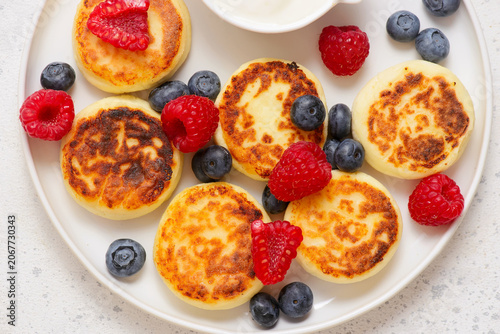Protein cottage cheese pancakes with Greek yogurt and berries.top veiw