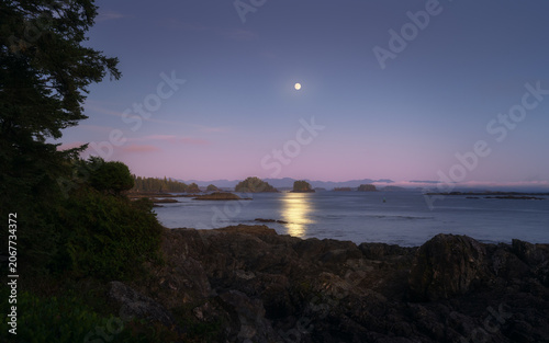 Full moon rising over the Pacific Ocean at twilight, Ucluelet, Vancouver Island