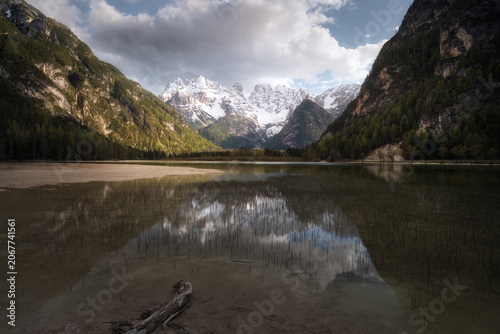 Sunset view with water lake reflections at Lago Di Landro, Italian Dolomites