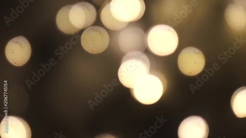Golden bokeh lights on dark background