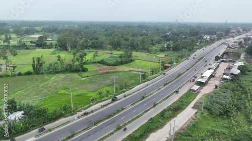 Aerial view of asian highway traffic and rural landscape