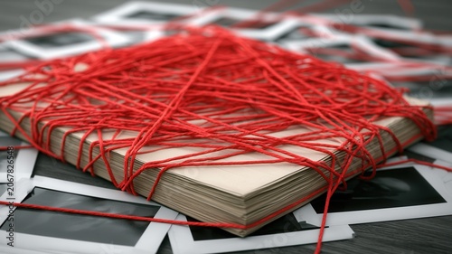 Top secret AI ethics investigation file surrounded by evidence photographs, red thread connections, realistic paper textures, vintage intelligence bureau atmosphere