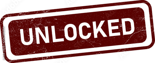 Fotografie Grungy red rubber stamp with unlocked text on white background