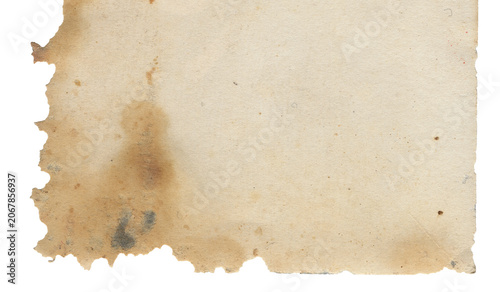 Fotografie Old stained paper sheet with weathered texture, burned torn edges and antique parchment appearance isolated on transparent background