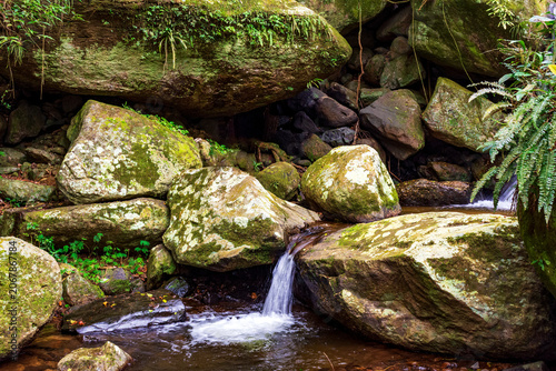Small stream and waterfall among the rocks on Ilhabela Island off the coast of Sao Paulo.