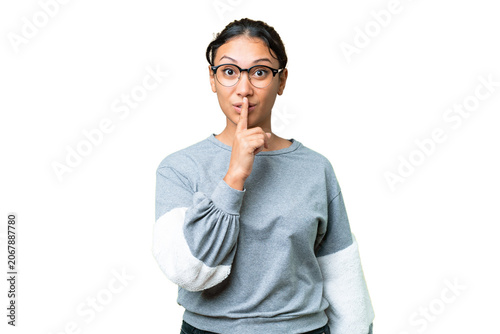 Fotografie Young Uruguayan woman over isolated chroma key background showing a sign of sile