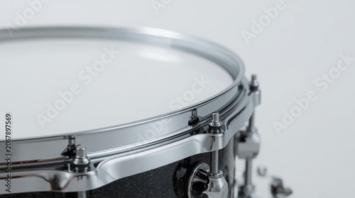 Clean Snare Drum Edge Detail on White Background Representing Professional Music Equipment