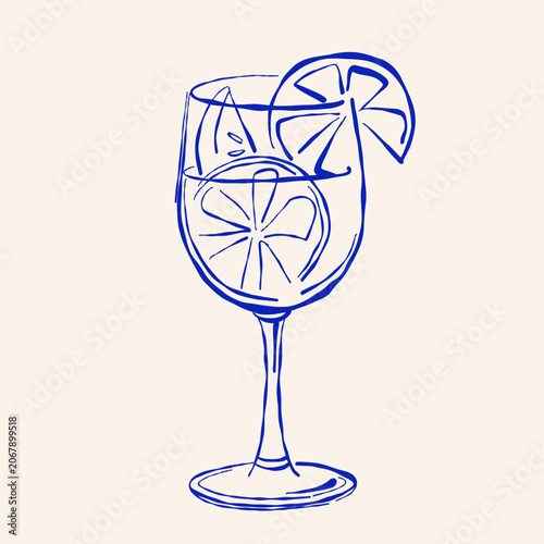 Foto Citrus cocktail in stemmed glass with two fruit slices