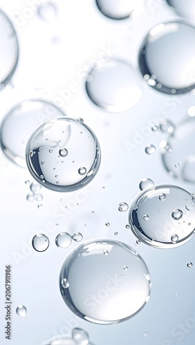 Macro view of transparent bubbles floating in a clear liquid.