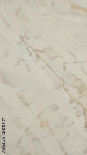 Texture creamy brie or camembert cheese macro, rotation