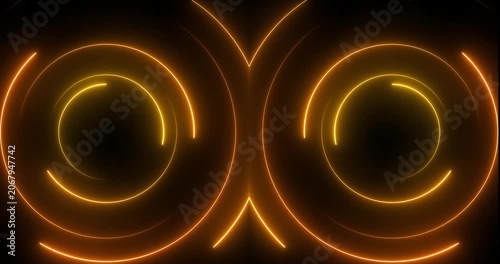 Abstract glowing neon light circle of yellow color, loading icon animation background. Abstract geometric neon background. Round frames, rings, circles, glowing lines appear