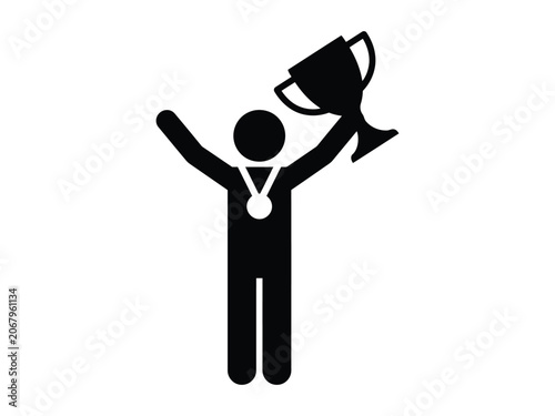 Obraz na plátně Silhouette of a person holding a trophy aloft and wearing a medal celebrating a