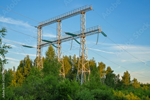 Canvas Print Metal electrical transmission portal with suspension insulators and overhead cab